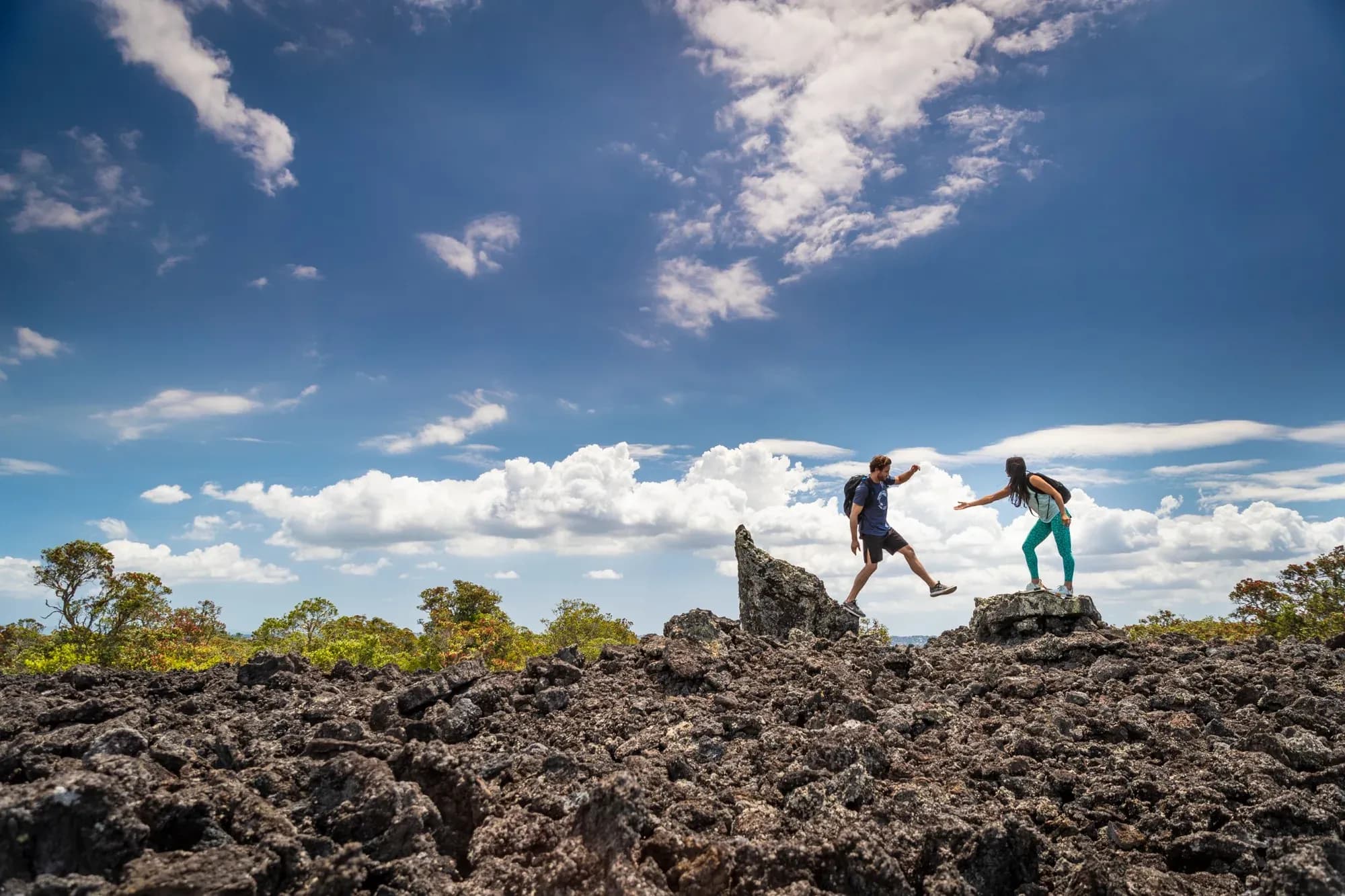 Walkers In the Scoria field of Rangitoto - Peretu